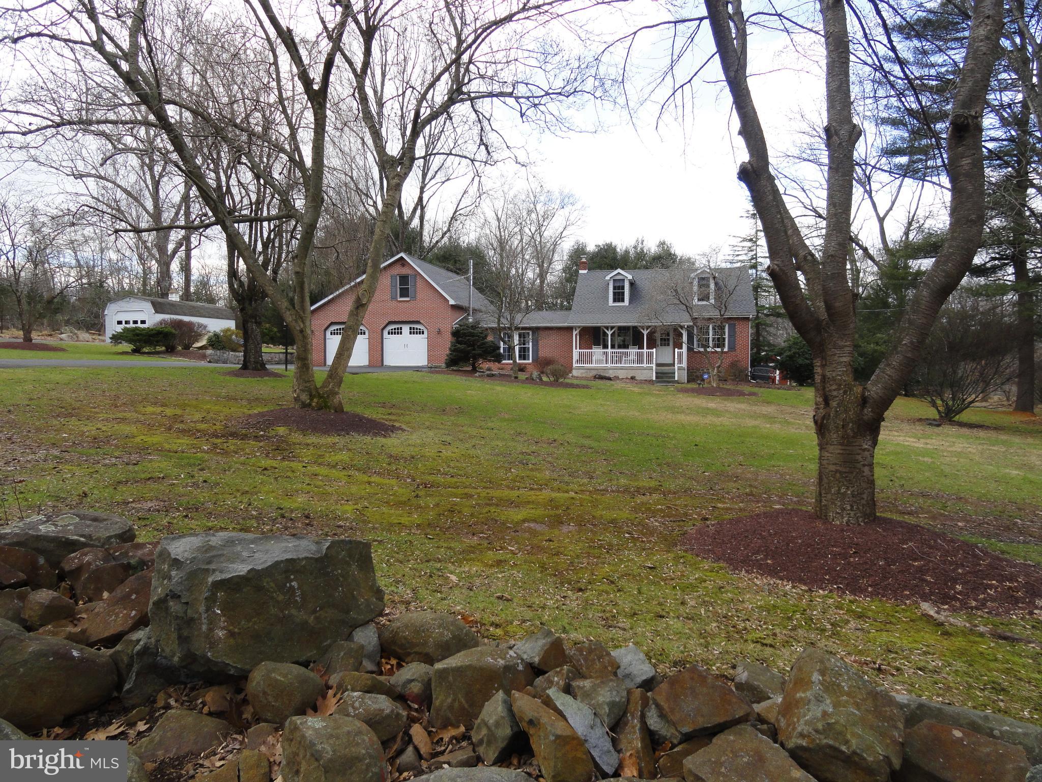 793 Henning Road Perkiomenville, PA 18074 - Photo 48 of 67 Stone wall border along road frontage