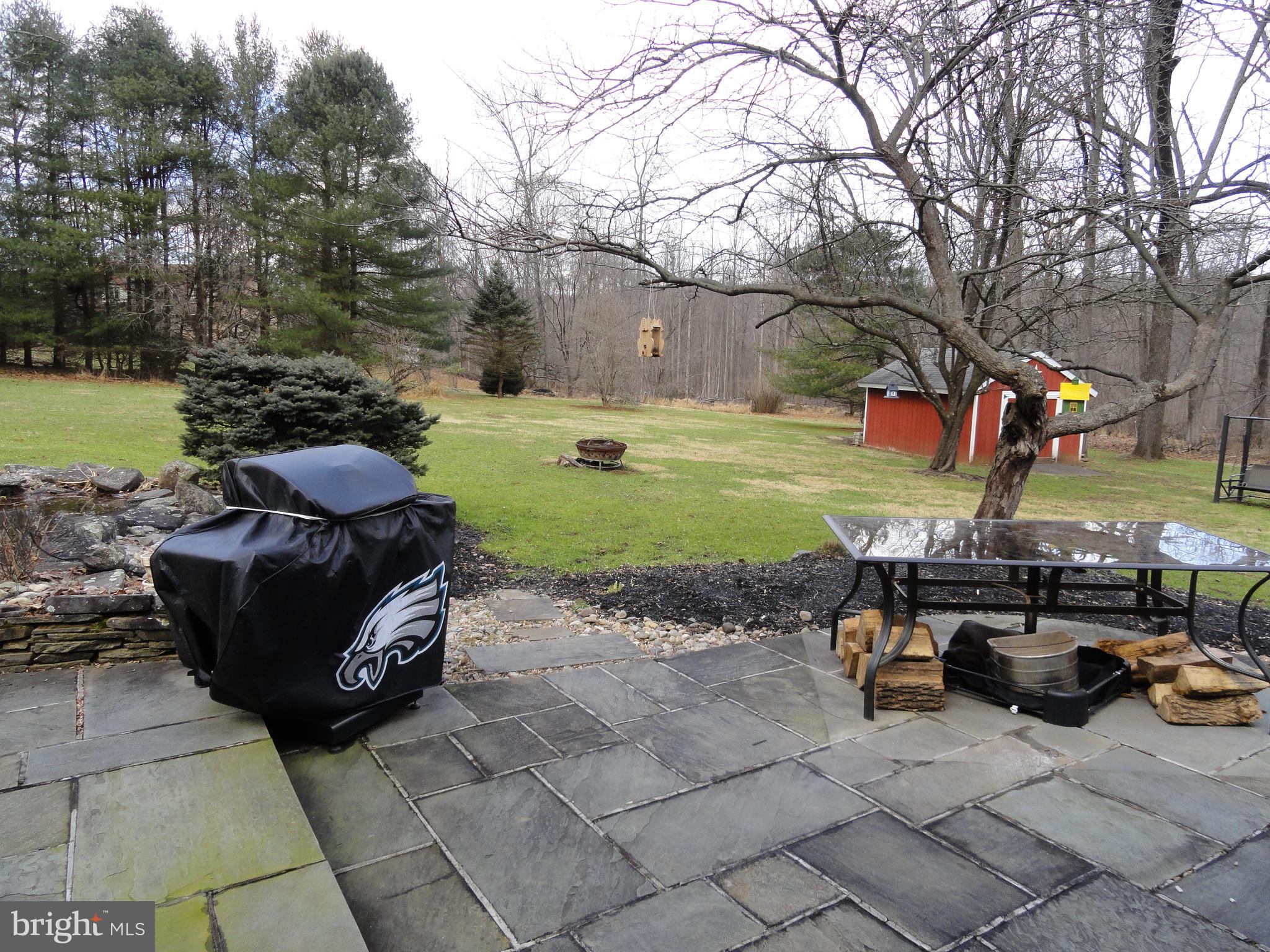 793 Henning Road Perkiomenville, PA 18074 - Photo 64 of 67 Flagstone patio area from Sun room
