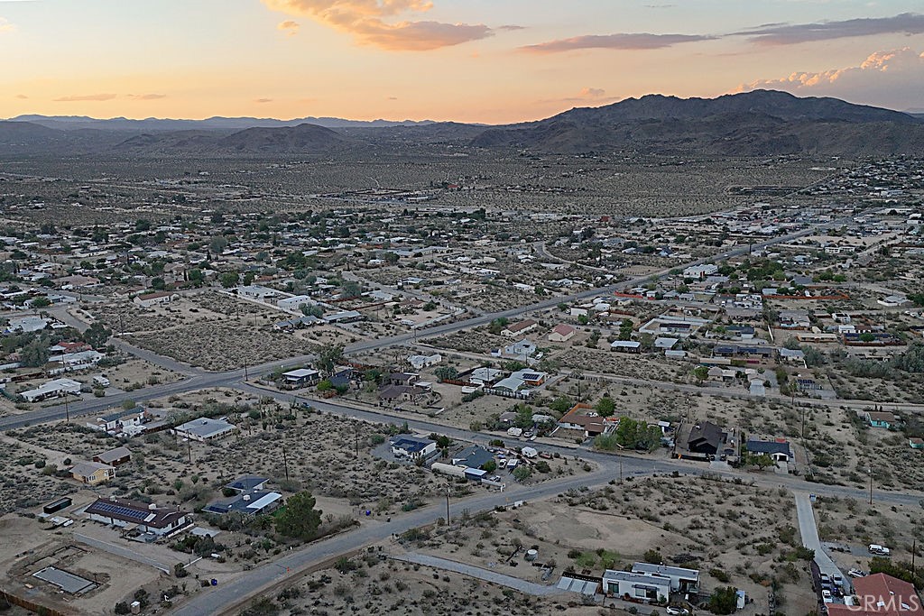 6935 Alturas Drive Joshua Tree, CA 92252 - Photo 35 of 35 Wonderfully situated to see snow capped mountains and the beautiful local hills.