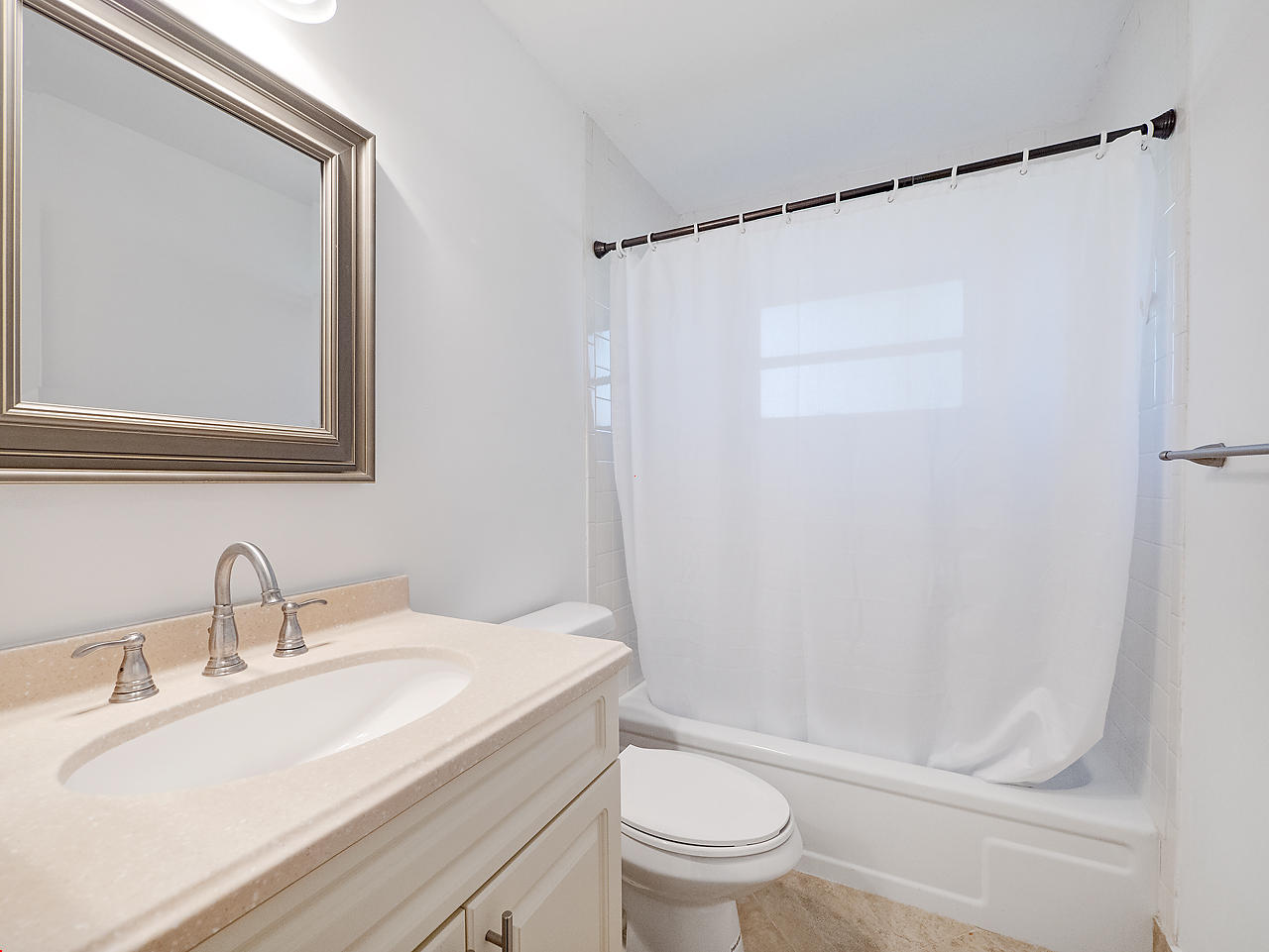 6723 Moonlit Drive Delray Beach, FL 33446 - Photo 15 of 16 a bathroom with a sink and a mirror