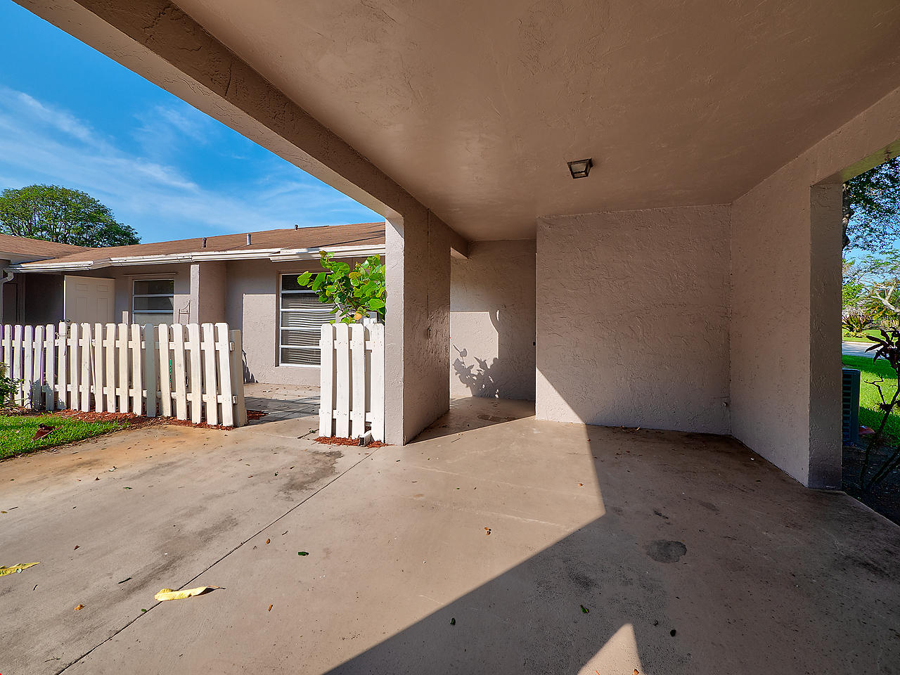 6723 Moonlit Drive Delray Beach, FL 33446 - Photo 2 of 16 a view of a house with a yard
