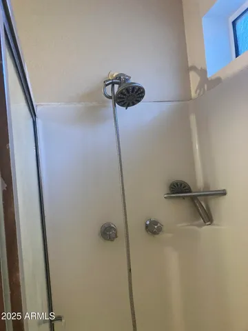 a view of a house with a yard and garage