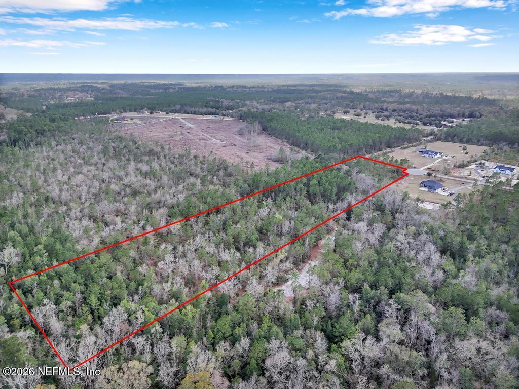 15364 Bullock Bluff Road Bryceville, FL 32009 - Photo 16 of 24 a view of a city with a mountain