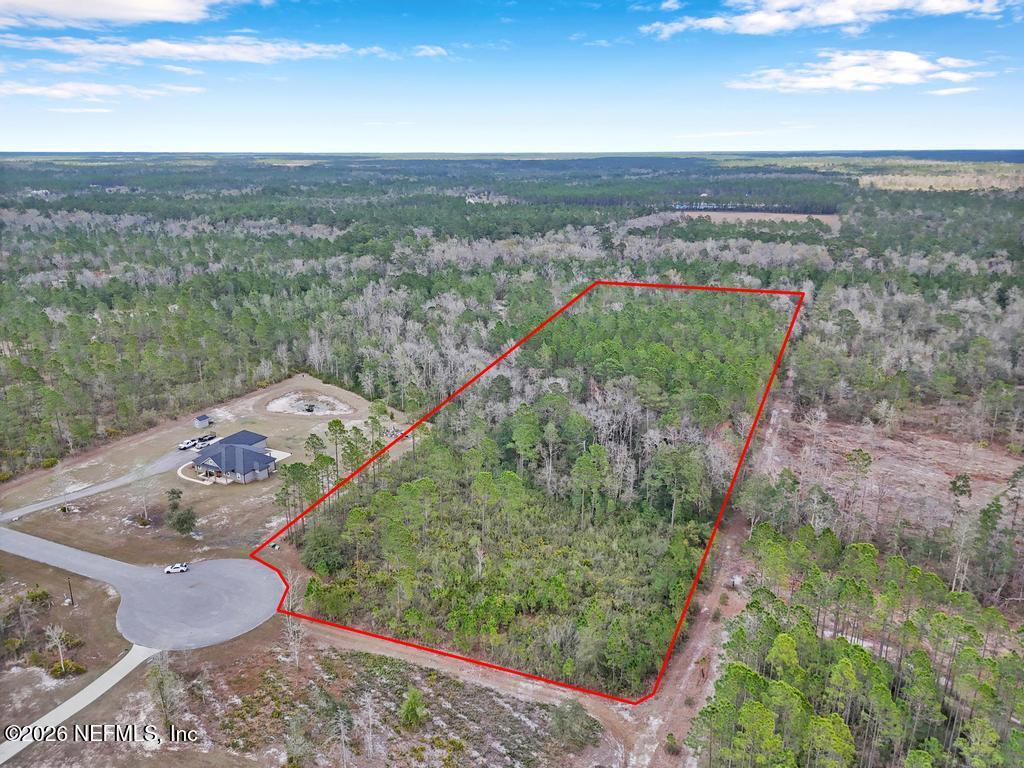 15364 Bullock Bluff Road Bryceville, FL 32009 - Photo 24 of 24 a view of a outdoor space with a lake view