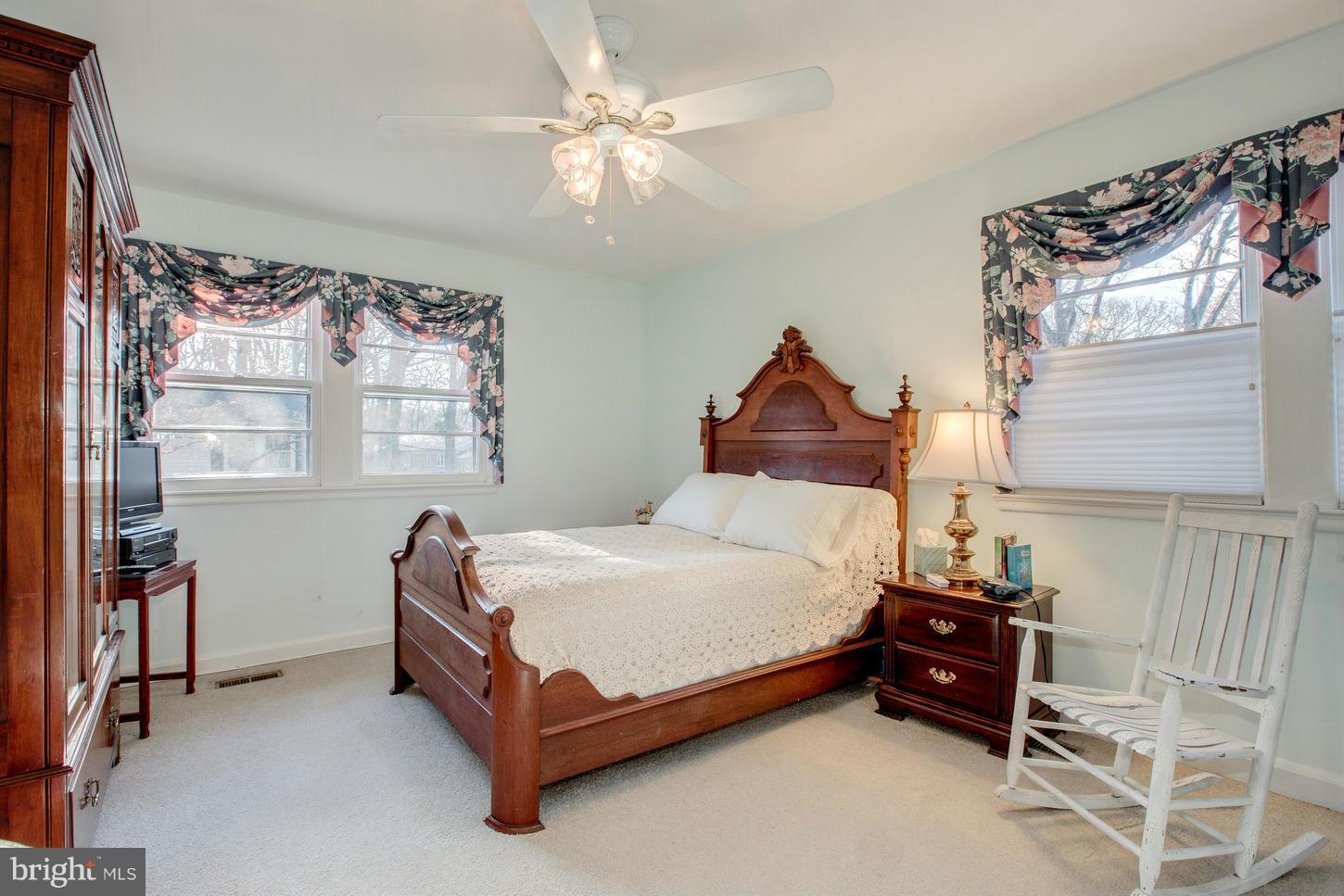 8632 Geren Road, Unit 158 Silver Spring, MD 20901 - Photo 12 of 20 a bedroom with a bed and a window