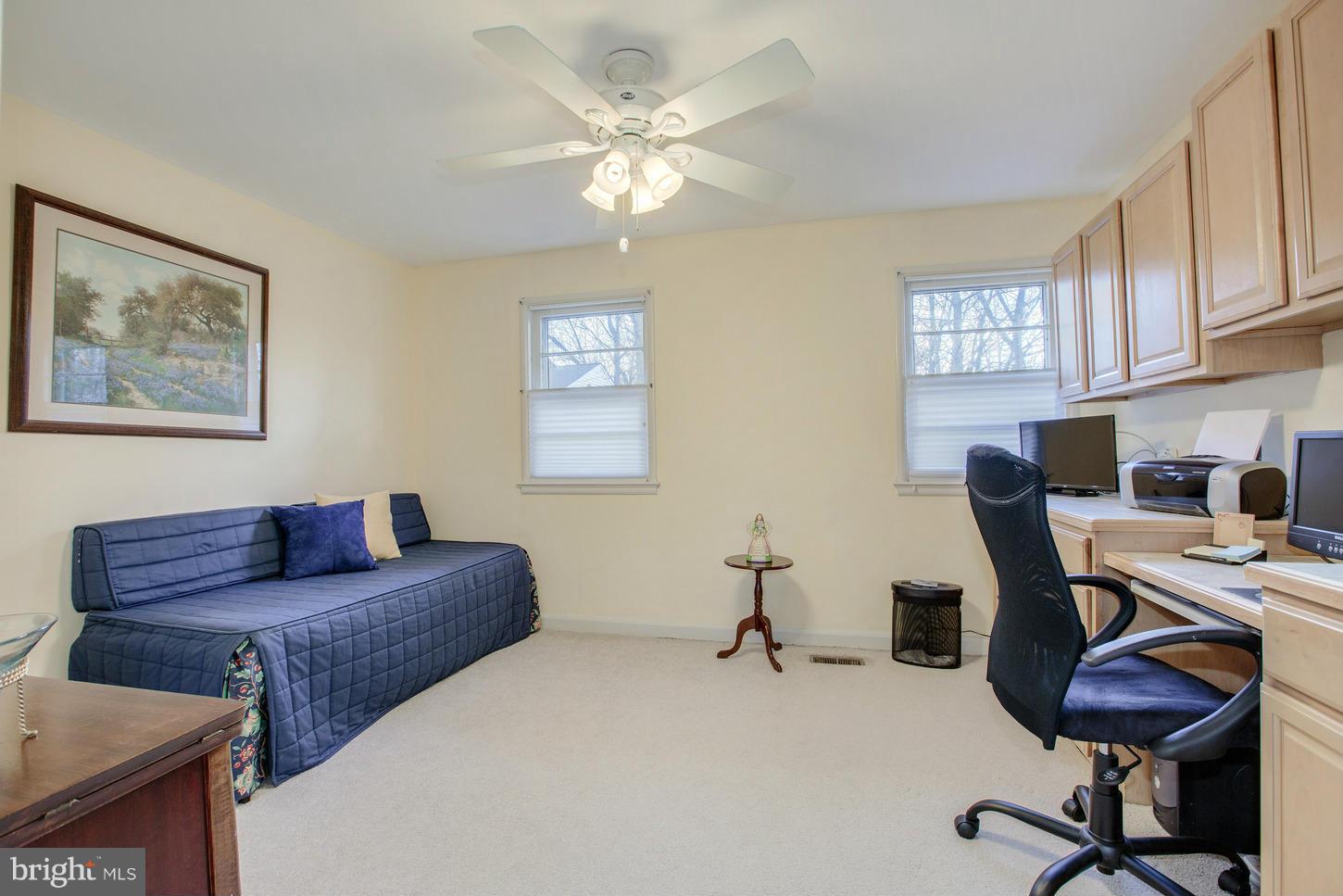 8632 Geren Road, Unit 158 Silver Spring, MD 20901 - Photo 15 of 20 a workspace with furniture and a chandelier