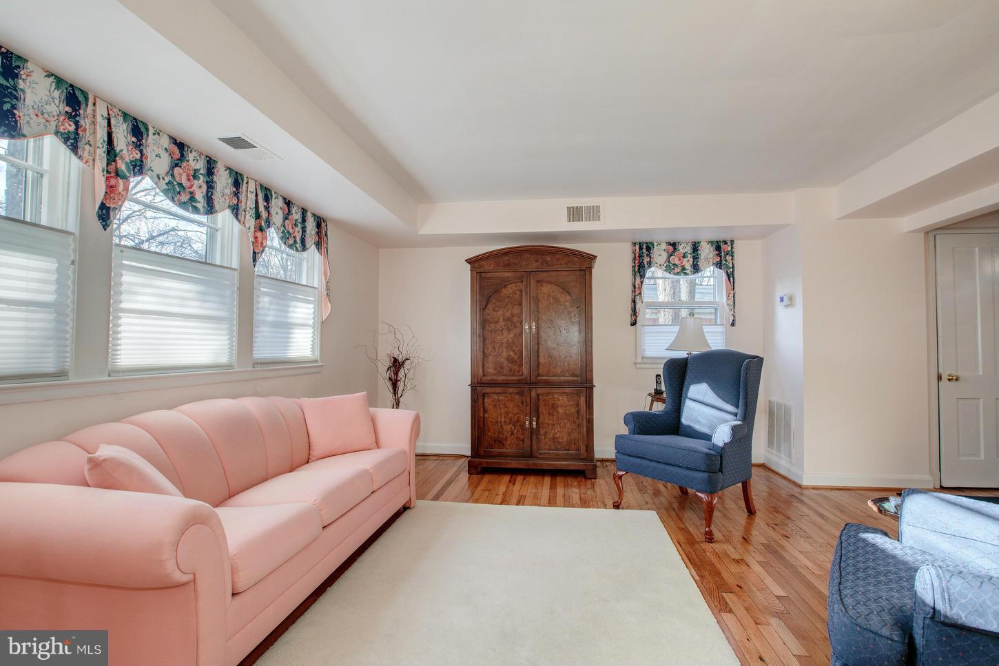 8632 Geren Road, Unit 158 Silver Spring, MD 20901 - Photo 4 of 20 a living room with furniture and a window