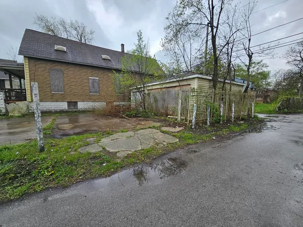 a backyard of a house with lots of green space