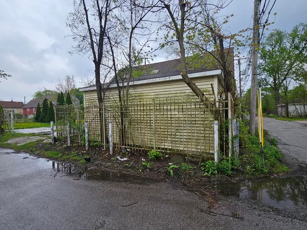 a house view with a garden space