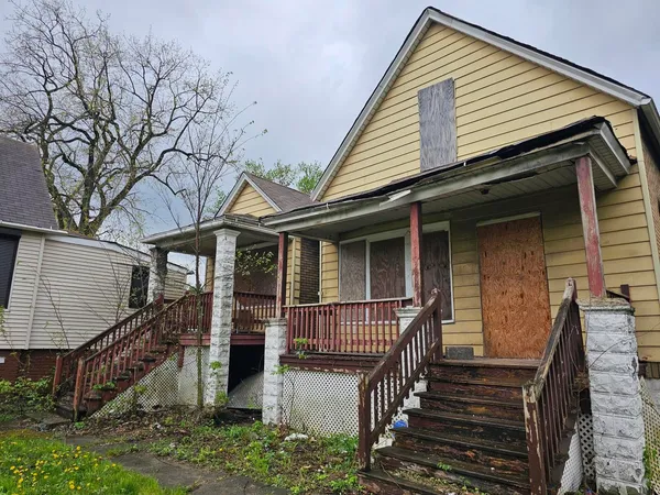 a front view of a house with a balcony