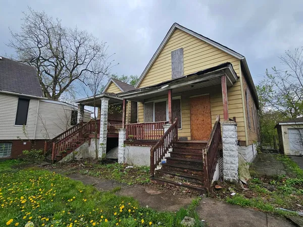 front view of a house with a small yard