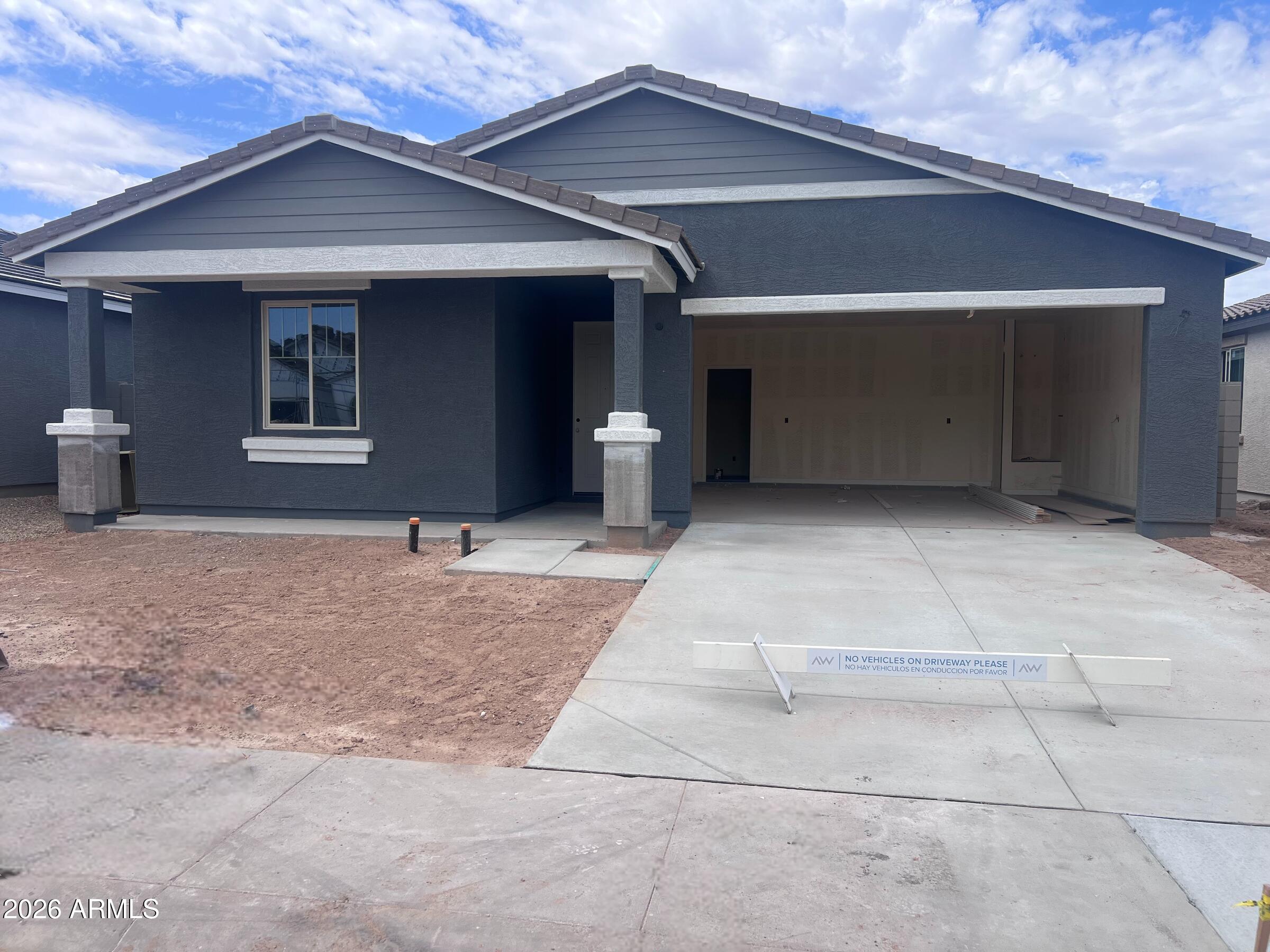 9524 West Gaby Road Tolleson, AZ 85353 - Photo 2 of 13 001 Exterior Front