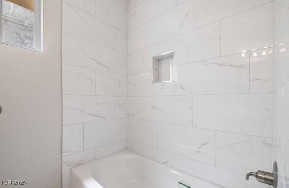 239 West Cleveland Avenue, Unit 5 Las Vegas, NV 89102 - Photo 5 of 9 Full bath featuring tub / shower combination