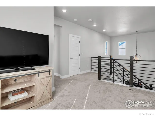 a view of a livingroom with furniture