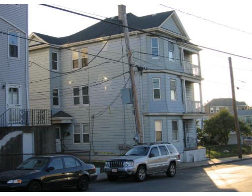 43 William Street Fall River, MA 02721 - Photo 1 of 7 a car parked in front of a white building