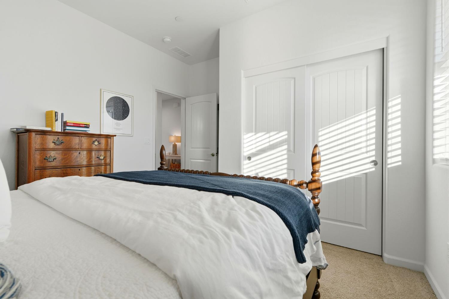 2566 Muscat Court Hanford, CA 93230 - Photo 11 of 55 a bedroom with a bed and a window