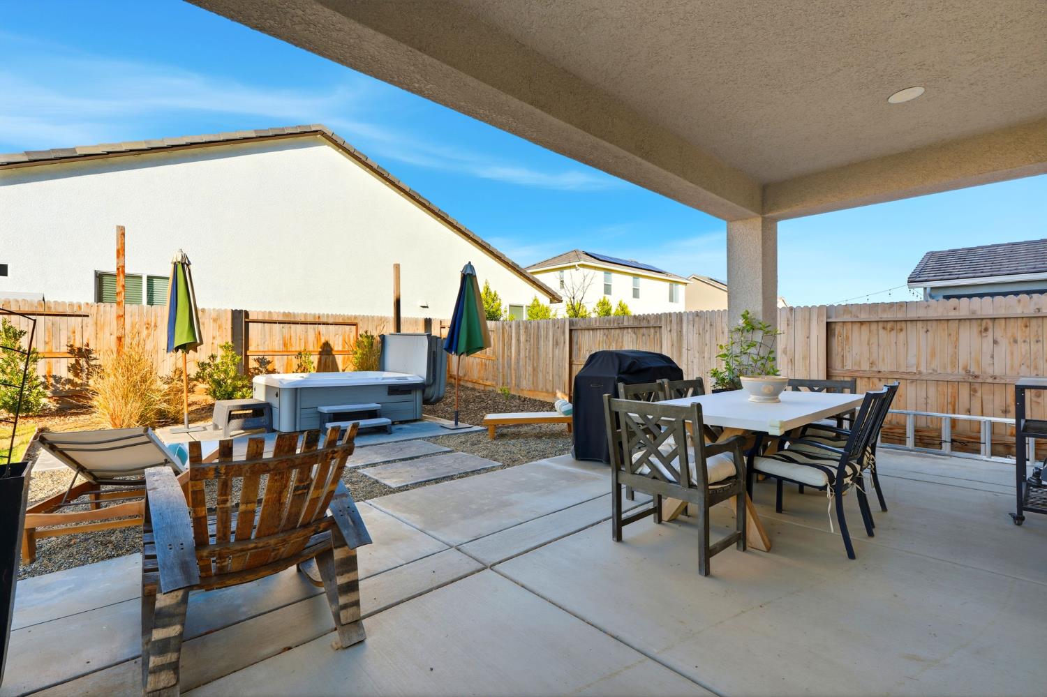 2566 Muscat Court Hanford, CA 93230 - Photo 46 of 55 a dining room with furniture and a floor to ceiling window