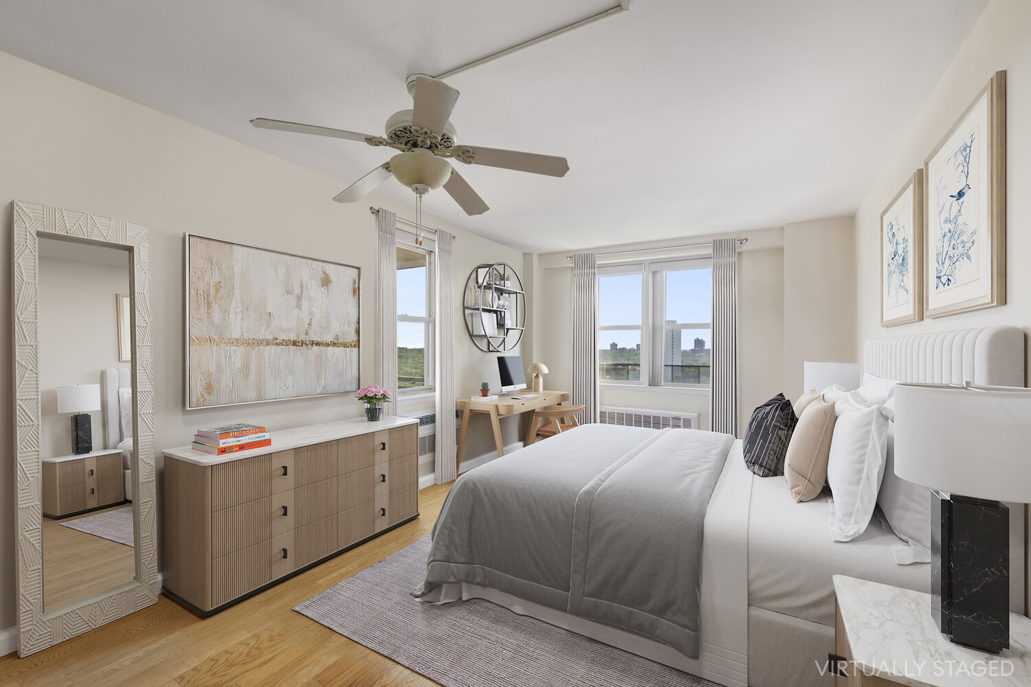 5700 Arlington Avenue, Unit 12E Bronx, NY 10471 - Photo 2 of 15 a bedroom with a bed and a chandelier