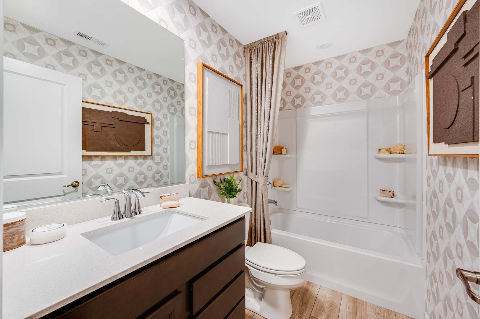 1255 Glenmont Street Algonquin, IL 60102 - Photo 19 of 21 a bathroom with a sink a toilet a mirror a bathtub and shower