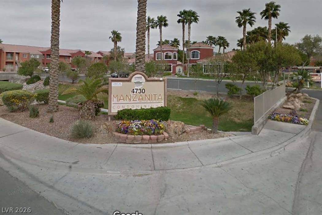 4730 East Craig Road, Unit 2029 Las Vegas, NV 89115 - Photo 3 of 4 Mature palm trees and manicured landscaping welcome residents to this desirable community.