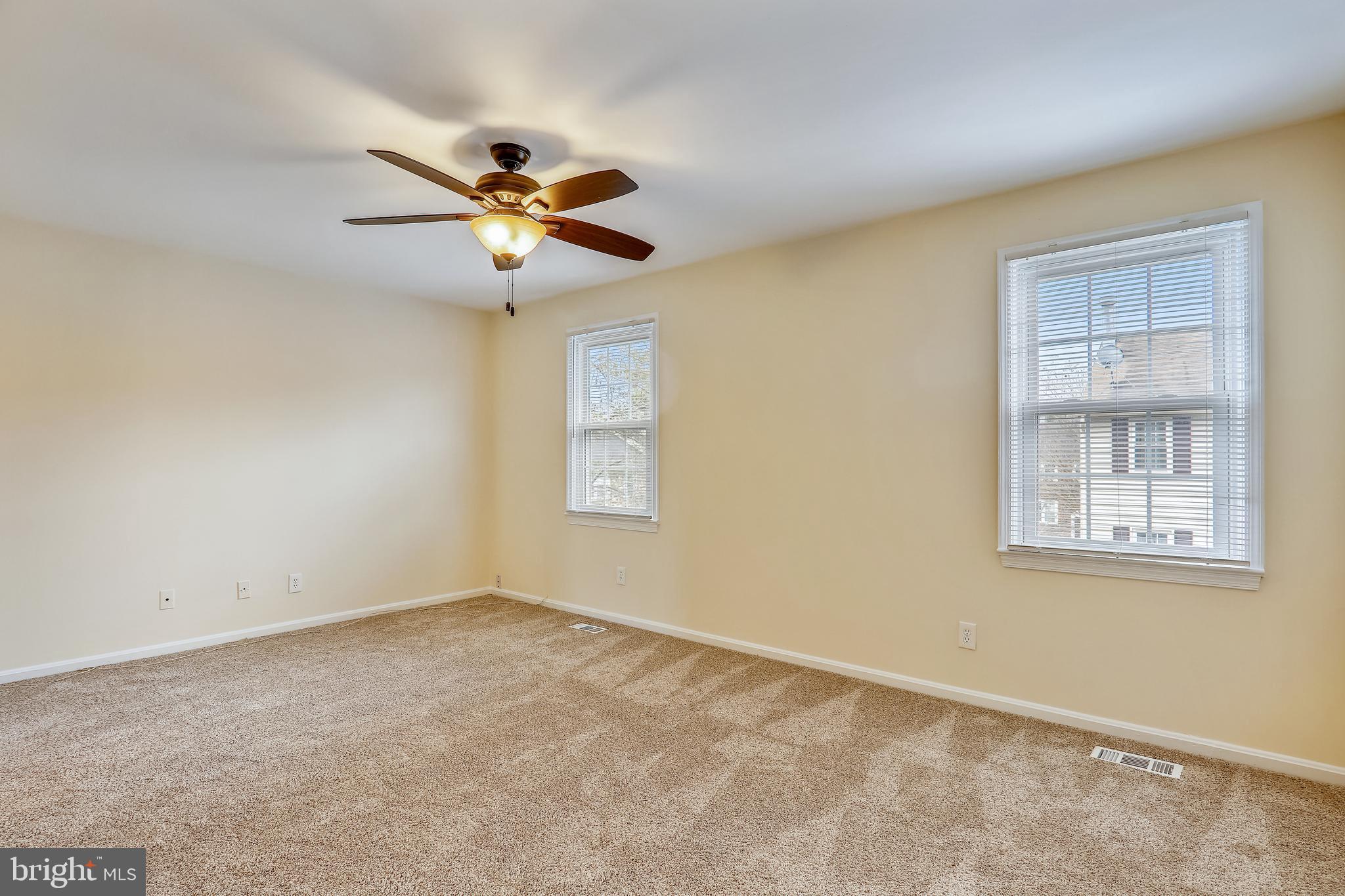 10600 Georgia Avenue Silver Spring, MD 20902 - Photo 17 of 44 Upper level primary bedroom