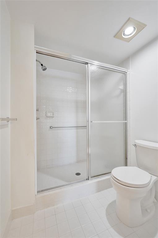 9563 Weldon Circle, Unit D212 Tamarac, FL 33321 - Photo 37 of 69 a bathroom with a toilet and a shower