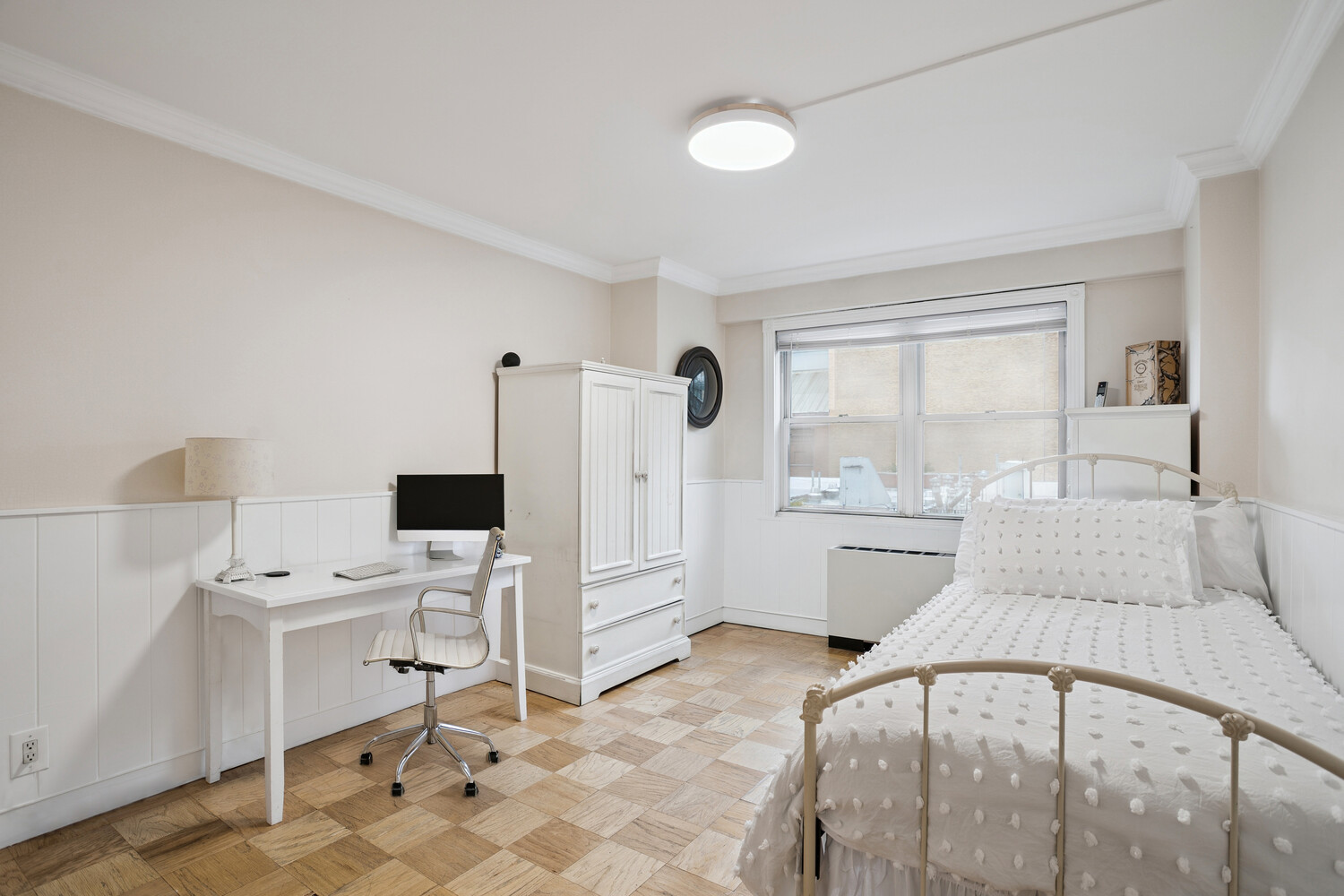 520 East 76th Street, Unit 8C Manhattan, NY 10021 - Photo 6 of 10 a room with a bed and a view of bathroom