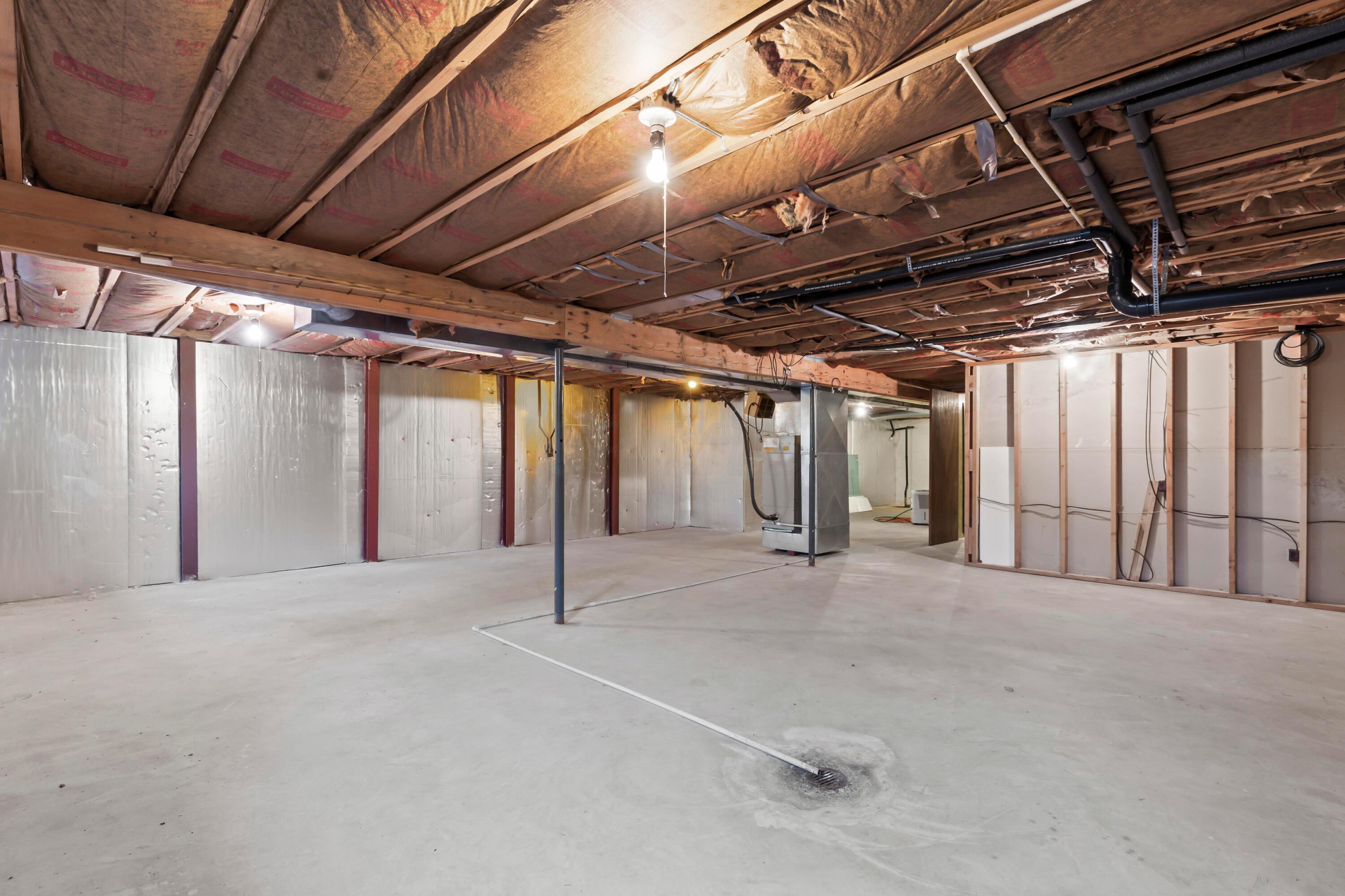 5764 Cheshire Road Galena, OH 43021 - Photo 36 of 59 • Full with crawl space
• Concrete block foundation
• Utility sink
• Sump pump
• Electric dryer hookup
• New A.O.Smith® electric
water heater ~ 2021
• Lennox® central air
conditioner