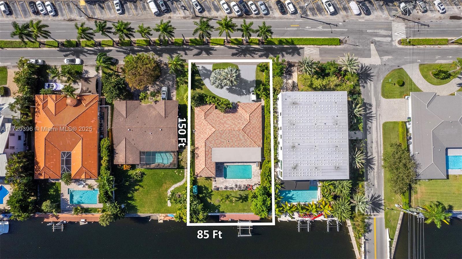 607 Layne Boulevard Hallandale Beach, FL 33009 - Photo 4 of 8 an aerial view of residential house with outdoor space and swimming pool