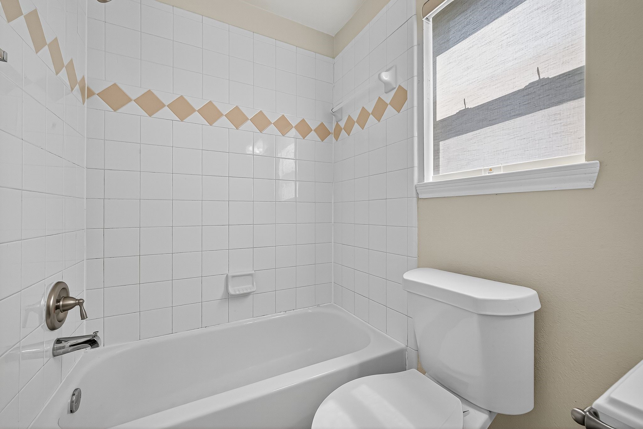 22406 Piper Terrace Lane Katy, TX 77450 - Photo 38 of 44 a bathroom with a toilet and a bathtub