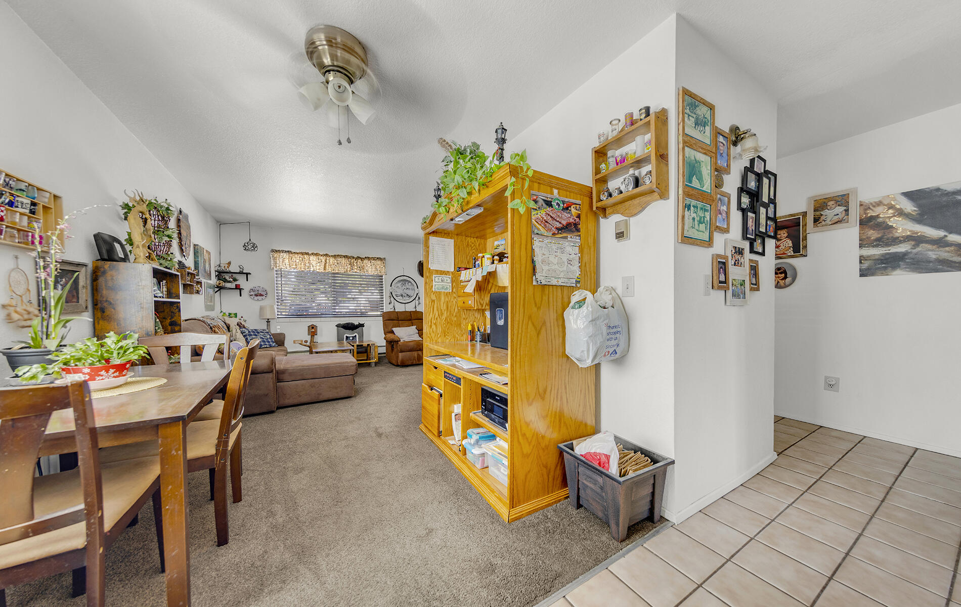 467 Martin Way Chester, CA 96020 - Photo 11 of 39 a living room with fish tank and a table & chairs in it