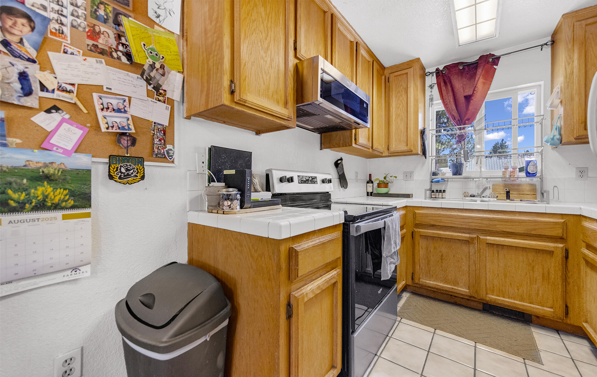 467 Martin Way Chester, CA 96020 - Photo 21 of 39 a kitchen with stainless steel appliances granite countertop a sink and a stove