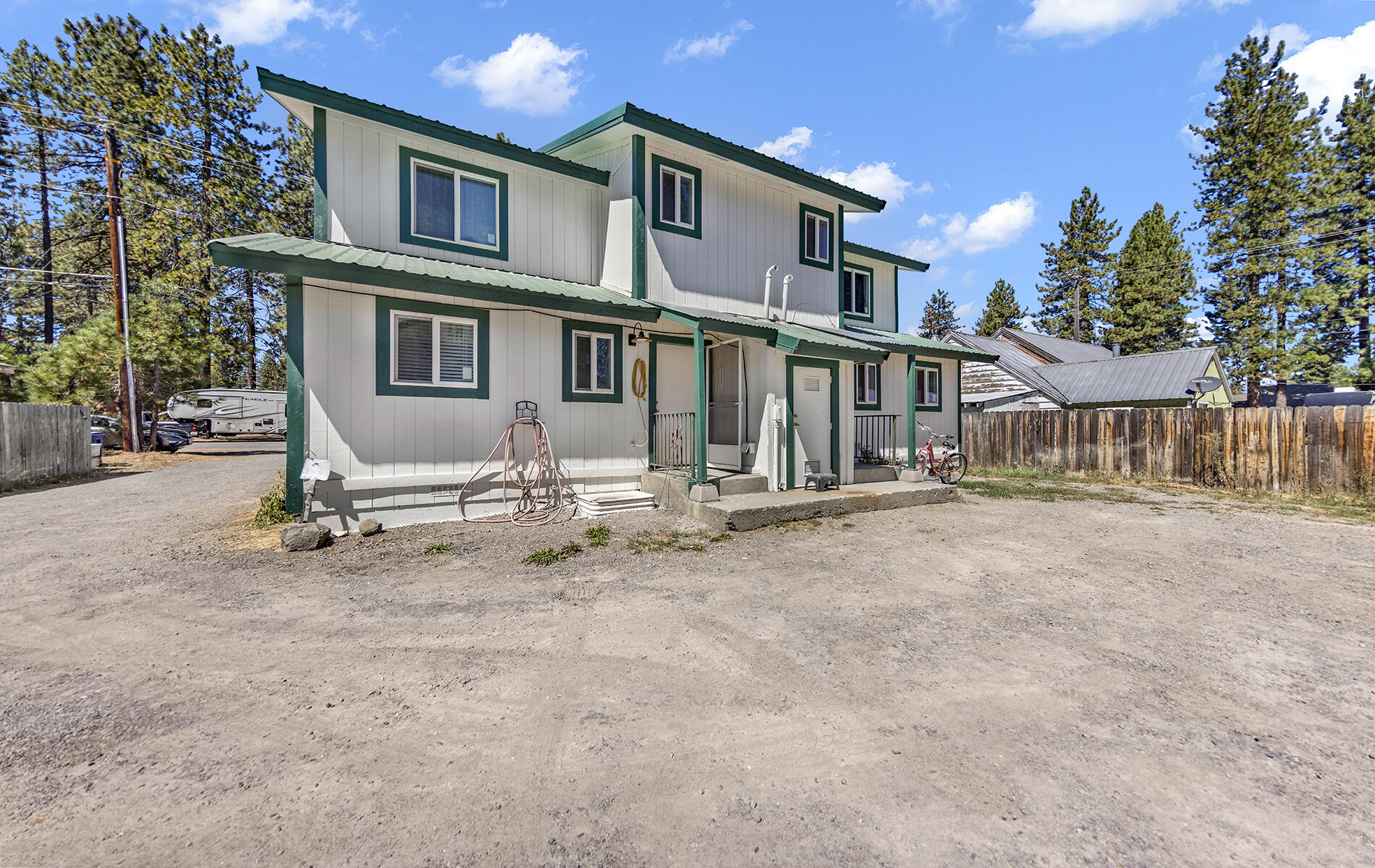 467 Martin Way Chester, CA 96020 - Photo 29 of 39 a backyard of a house with table and chairs