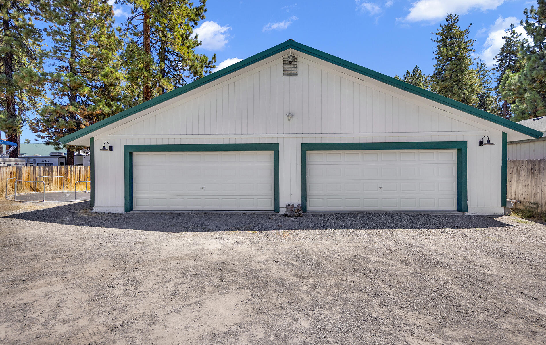 467 Martin Way Chester, CA 96020 - Photo 3 of 39 a front view of a house with a yard and garage