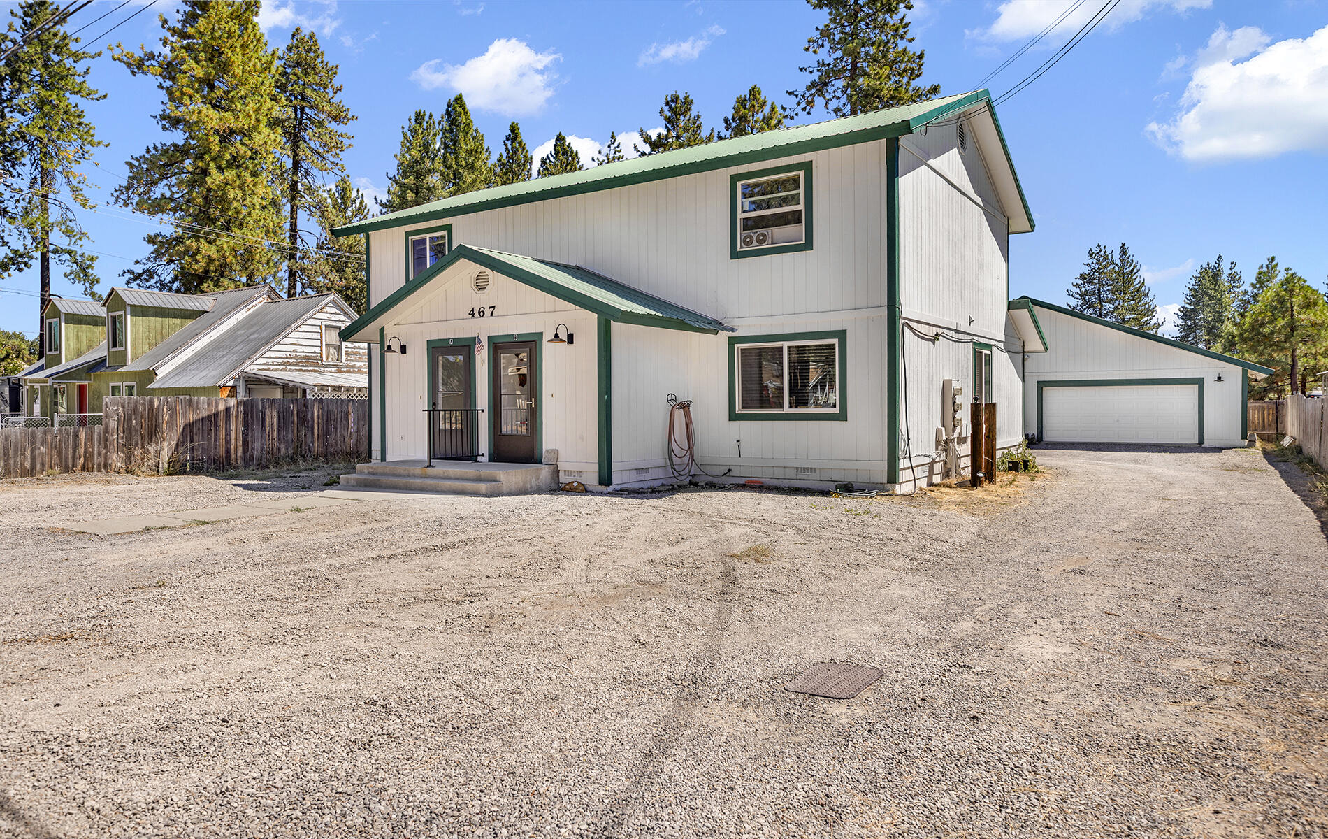 467 Martin Way Chester, CA 96020 - Photo 33 of 39 a front view of a house with a yard and garage