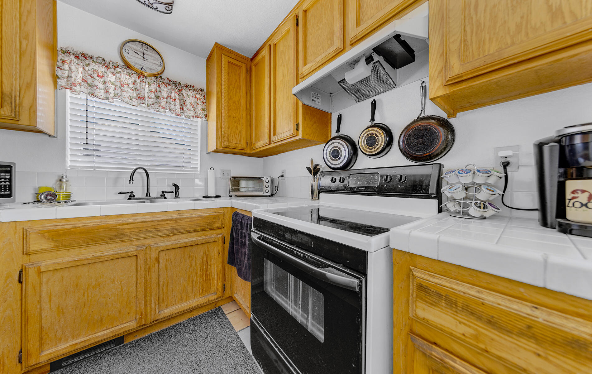 467 Martin Way Chester, CA 96020 - Photo 9 of 39 a kitchen with stainless steel appliances granite countertop a sink and cabinets