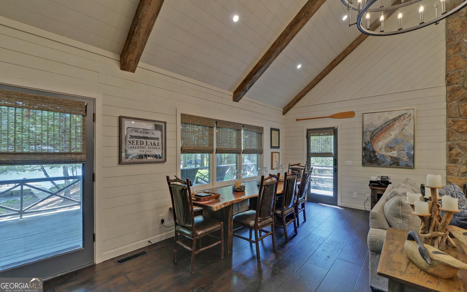 2857 Crow Creek Road Lakemont, GA 30552 - Photo 12 of 74 a view of a dining room with furniture window and wooden floor