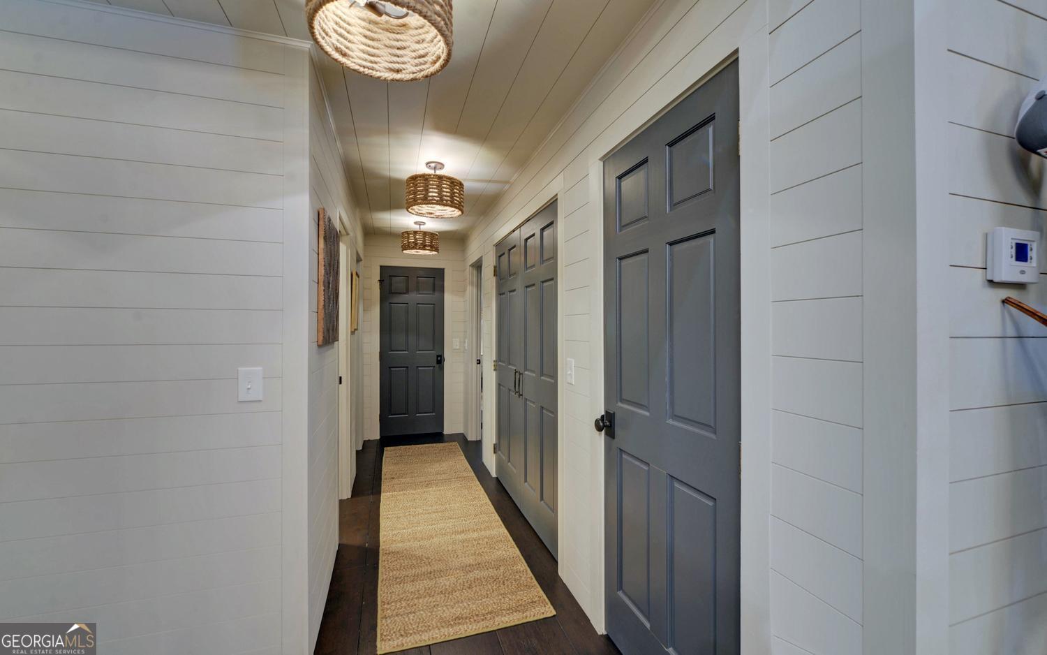 2857 Crow Creek Road Lakemont, GA 30552 - Photo 18 of 74 a view of a hallway with windows