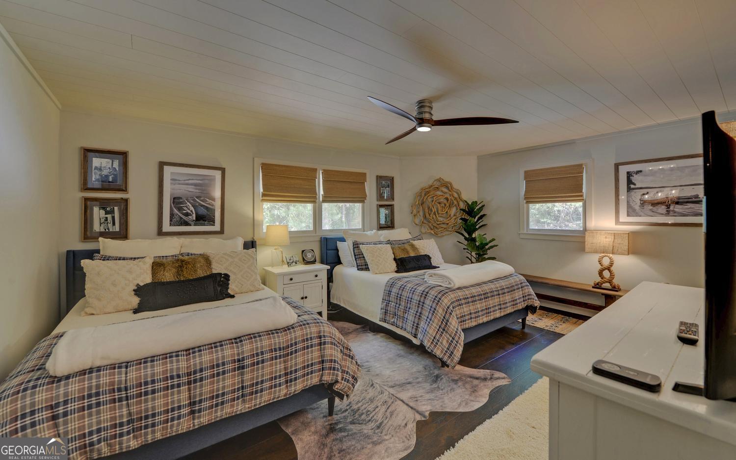2857 Crow Creek Road Lakemont, GA 30552 - Photo 27 of 74 a bedroom with bed and window