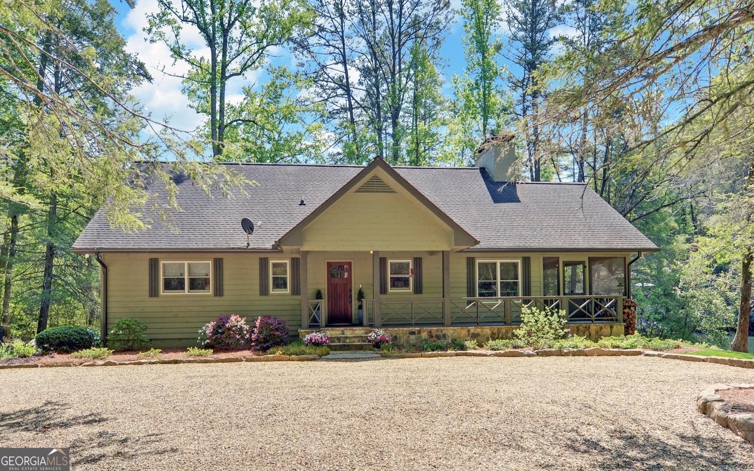 2857 Crow Creek Road Lakemont, GA 30552 - Photo 3 of 74 front view of a house with a yard