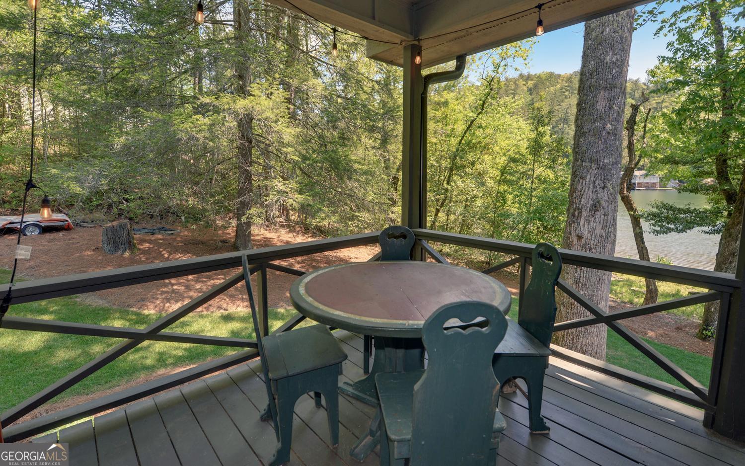 2857 Crow Creek Road Lakemont, GA 30552 - Photo 36 of 74 a view of a chairs and table in patio
