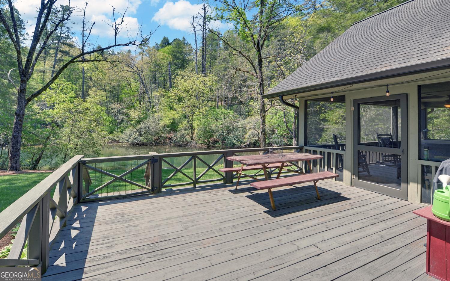2857 Crow Creek Road Lakemont, GA 30552 - Photo 43 of 74 a view of balcony with deck and wooden floor