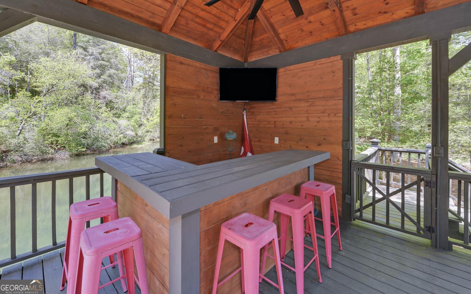 2857 Crow Creek Road Lakemont, GA 30552 - Photo 54 of 74 a view of a balcony with furniture
