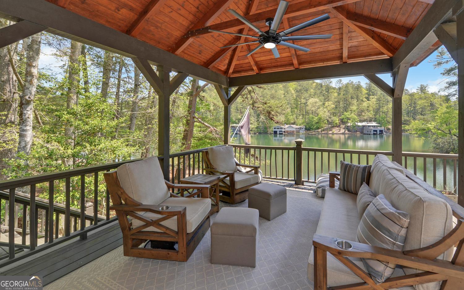2857 Crow Creek Road Lakemont, GA 30552 - Photo 57 of 74 a view of a chairs and table in patio