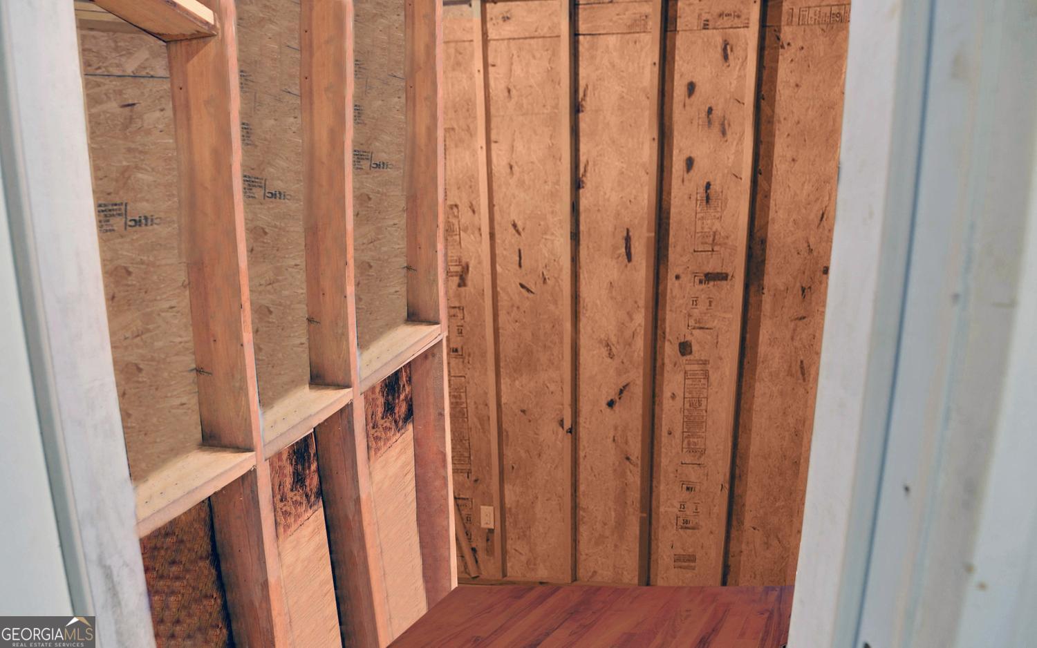 2857 Crow Creek Road Lakemont, GA 30552 - Photo 60 of 74 a view of a hallway with wooden floor and staircase