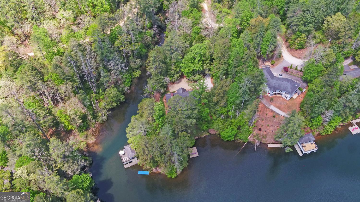 2857 Crow Creek Road Lakemont, GA 30552 - Photo 68 of 74 an aerial view of a house with a yard and lake view
