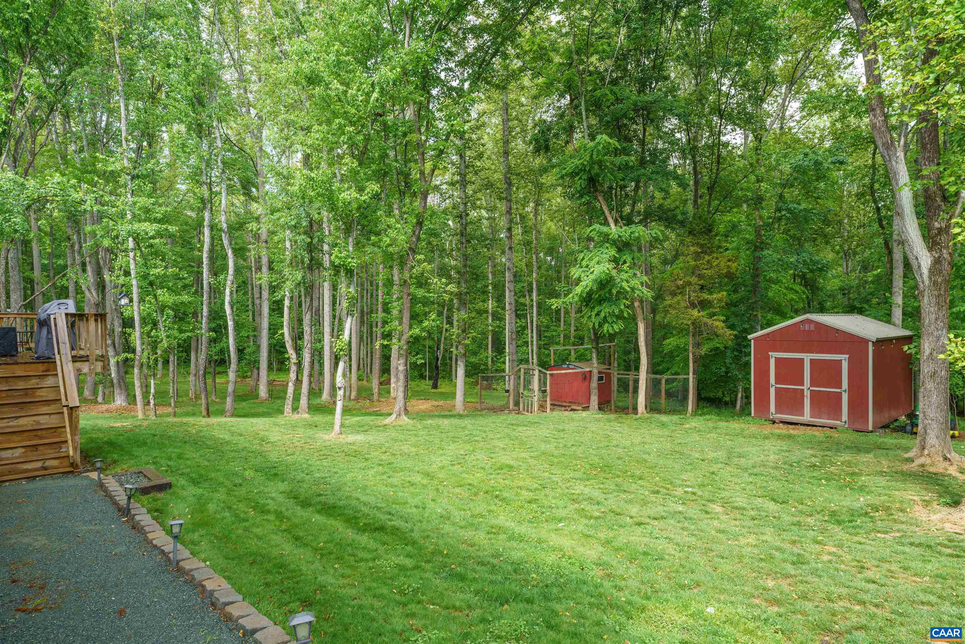 1760 Haden Martin Road Palmyra, VA 22963 - Photo 44 of 51 a view of a backyard with a small cabin
