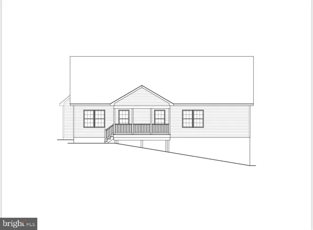 an aerial view of a residential houses with yard