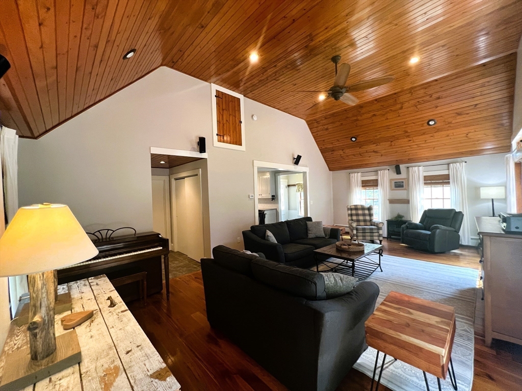 9 Newton Junction Road Kingston, NH 03848 - Photo 6 of 40 a living room with furniture and a wooden floor