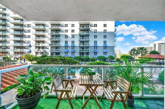 a bed sitting in a room next to a window